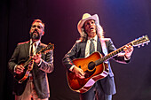 Cadiz, Spain, Nov 16 2024, Folk musicians Los Hermanos Cubero performing live at Cádiz, featuring traditional string instruments.