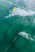 Aerial view of kite surfing on Praia da Cova da Alfarroba/Praia do Baia in Peniche
