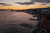 Aerial view of waterside Cais do Sodre at sunset, a buzzing nightlife and dining destination in Lisbon, Portugal