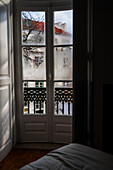 'I love Lisbon' hand written on a wet window in Alfama
