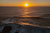 Aerial view of sunset landscape in Praia do Norte (North Beach), listed on the Guinness World Records for the biggest waves ever surfed, formed under the influence of the Nazare Canyon, Portugal