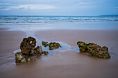 Rocks and formations on Praia Baleal-Norte beach in Baleal Island, Portugal