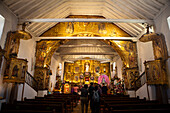 Immaculate Conception Church. Church built in 1693. It preserves within it objects of high historical, religious and cultural value such as the altar of mirrors and the triumphal arch, carved in high relief and polychrome wood with figures of saints and the devil. The altar of mirrors has 33 mirrors, which were used to support evangelization. The natives were told that they saw their spirits or the image of the God preached by the Jesuits in the mirrors. Everything in the church is from the Baroque period and is made of wood with Quito art in gold leaf.