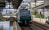 A Medellin Metro train arrives at Berrio Park Station on Line A in Medellin, Colombia.