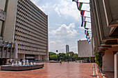 Flags on a City of Santiago de Cali office building in Cali, Colombia.