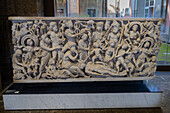 A 4th Century marble sarcophagus in the National Archaeological Museum of Naples, Naples, Italy. Depicted is the creation of humankind by Prometheus with numerous other deities included in the scene.