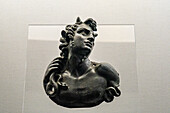 Bronze bust of a satyr in the Vesuvian Life Gallery, National Archaeological Museum of Naples, Naples, Italy. Used as decoration on a safe in Herculaneum.