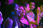 Spectators enjoying the artists' performances at the Pablo Tobón Uribe theater.