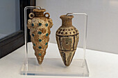 Miniature amphorae in the Vesuvian Life Gallery, National Archaeological Museum of Naples, Naples, Italy. The lead-glazed terra pieces are from Pompeii, circa 1st Century A.D.