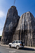 The exterior of the unusual Church of Our Lady of Chiquinquirá in El Peñol in Colombia. The tower imitates the shape of the nearby Piedra del Peñon.