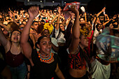 Spectators enjoying the artists' performances at the Pablo Tobón Uribe theater.
