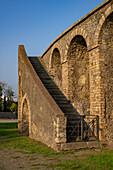 The exterior of the Amphitheater of Pompeii in the ancient Roman ruins of Pompeii in Italy.