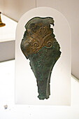 A bronze prometopidion or horse-head armor in the National Archaeological Museum of Naples, Naples, Italy. Magna Graecia Collection. A prometopidion was a protective shield for the horse's forehead in battle.