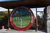 Wooden sign in the Los Nevados Natural National Park in Colombia.