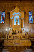 A side chapel with a statue of Mary in the Metropolitan Cathedral of Medellín, Medellin, Colombia.
