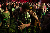 Spectators enjoying the artists' performances at the Pablo Tobón Uribe theater.
