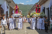 Procession of the Risen Christ, Easter Sunday. Holy Week in Santa Fe de Antioquia. The celebration of this Catholic tradition in this municipality in the department of Antioquia, Colombia, is one of the most important in the country. The processions through its old cobblestone streets are a tradition dating back to the colonial era and are accompanied by the smoke of incense and the songs and prayers of the penitents who accompany them.