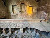The hypocaust floor supports in the calidarium in the Stabian Baths in the ancient Roman ruins of Pompeii, Italy.
