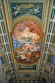Painted ceiling in the Great Hall of the Sundial in the National Archaeological Museum of Naples, Naples, Italy. The three-dimensional appearance of the ceiling is an optical illusion, created by the artists.