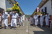 Procession of the Risen Christ, Easter Sunday. Holy Week in Santa Fe de Antioquia. The celebration of this Catholic tradition in this municipality in the department of Antioquia, Colombia, is one of the most important in the country. The processions through its old cobblestone streets are a tradition dating back to the colonial era and are accompanied by the smoke of incense and the songs and prayers of the penitents who accompany them.