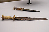 Iron & bone daggers in the Vesuvian Life Gallery, National Archaeological Museum of Naples, Naples, Italy. From the Gladiatorial Barracks in Pompeii, circa 1st Century A.D.