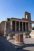 Columns of the Basilica, Building VIII.1.1, with the Tribunal at the west end in the ancient Roman ruins of Pompeii, Italy.