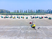 Cox'S Bazar, Bangladesh - 06 February 2024: Aerial view of colorful fishing boats along the coastline with golden sands and turquoise waters, Cox's Bazar, Cox's Bazar, Bangladesh.