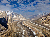 Aerial view of majestic peaks and a glacier in a breathtaking alpine landscape, Concordia, Gilgit Baltistan, Pakistan.