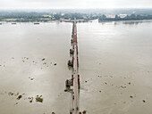 Aerial view of kalurghat bridge spanning the karnaphuli river, a historic steel structure and iconic landmark, Chittagong, Bangladesh.