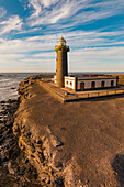 Aerial view of lighthouse punta de Jandia with rocky shore and ocean, Fuerteventura Island, Canary Islands, Spain.