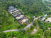Aerial view of khai dinh emperor mausoleum surrounded by lush greenery and ancient architecture, Thuy Bang, Huong Thuy, Thua Thien Hue, Vietnam.