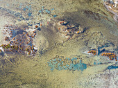 Aerial view of abstract and beautiful Salinas de Cerrillos with unique patterns and textures, El Ejido, Almeria, Spain.