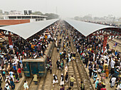 Gazipur, Bangladesh - 02 February 2025: Aerial view of a bustling train station with a vibrant crowd and dynamic activity, Tongi, Gazipur, Dhaka, Bangladesh.