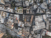 Aerial view of historic architecture and dense residential area with small streets, Sadar Ghat, Keraniganj, Dhaka, Bangladesh.