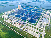 Aerial view of sewage treatment plant in urban area with modern infrastructure and water management systems, Dasherkandi, Dhaka, Bangladesh.