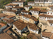 Aerial view of picturesque Mangalem with traditional Ottoman architecture and charming stone buildings, Berat, Albania.