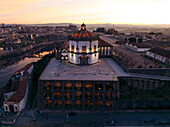 Aerial view of Mosteiro da Serra do Pilar at sunrise with beautiful dome and scenic cityscape, Santa Marinha, Vila Nova de Gaia, Porto, Portugal.