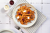 Crispy baked sweet potato sticks, seasoned with aromatic spices, served with creamy aioli and vibrant beet ketchup Perfect for a healthy, colourful snack or starter