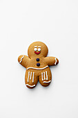 A charming gingerbread man with classic icing details on a white background - perfect for holiday themes, baking inspiration or festive displays
