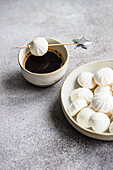 Delicious homemade vanilla mini zephyr marshmallows filled with rose jam, paired with a refreshing coffee liqueur drink A delicious and indulgent treat