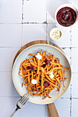 Crispy baked, spiced sweet potato sticks, served with creamy aioli and bright beetroot ketchup - perfect as a healthy snack or starter