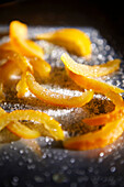 Candied yuzu citrus peel on a tray