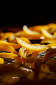 Candied yuzu citrus peel on a chilled shelf