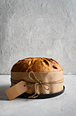 Traditional panettone with a perfect golden crust. An icon of Italian culinary traditions for the festive season
