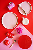 Pop art food, colour blocking aesthetic table design in modern pink and red theme.