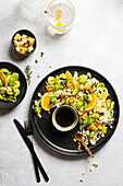 Roasted Brussels sprouts on Chinese cabbage salad with oranges and bread croutons
