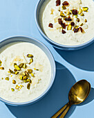 Classic kheer with pistachios and dates - Indian rice pudding