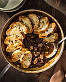 Beef pot pie with beef, mushrooms, sherry and baguette slices