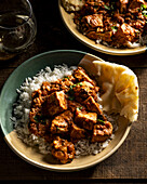 Chicken tikka masala with rice and naan