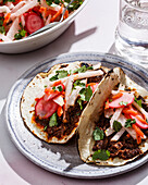 Tacos with beef and jicama slaw